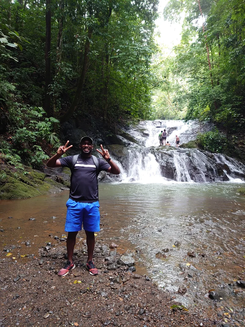 At a waterfall on a trip abroad