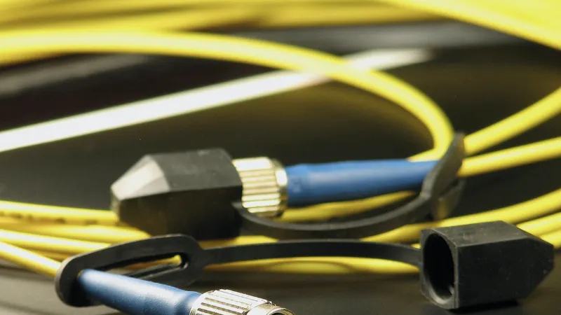 Yellow fiber optic patch cords with metal connectors